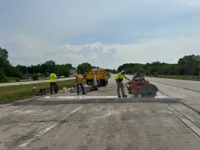 Highway operations workers working on county highway