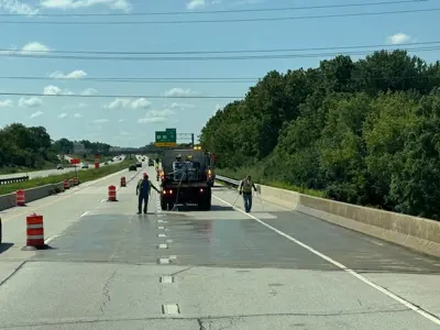 Highway workers in highway work zone